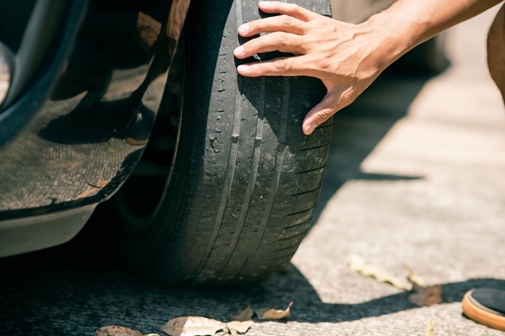 Checking tire tread for wear Checking tire tread for wear