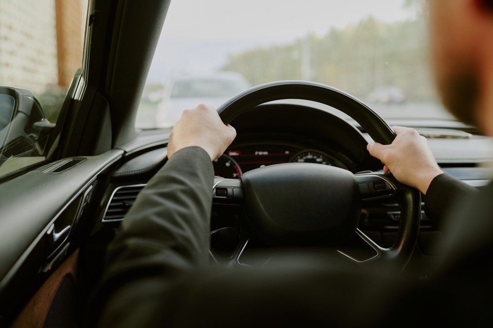Man steering car and driving Man steering car and driving