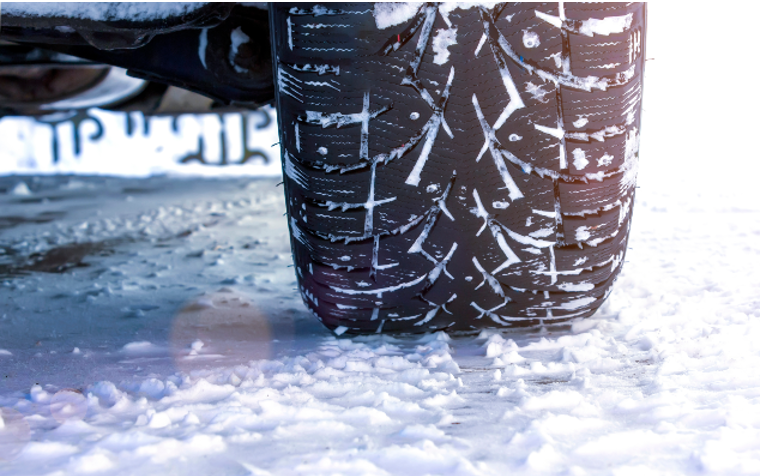 Snow tires on a snowy road Snow tires on a snowy road